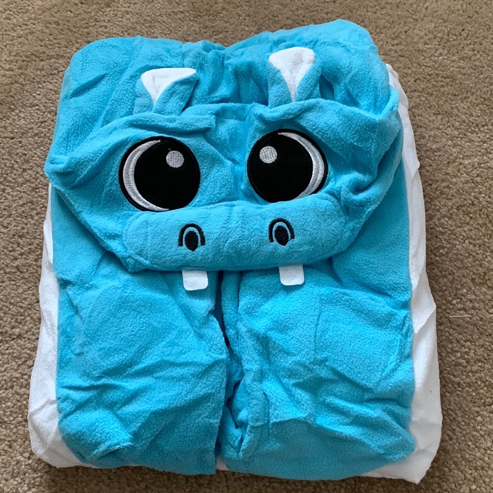 Blue dinosaur onesie